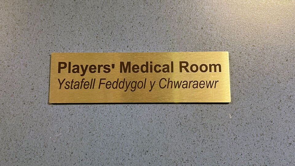 A view of the sign on the medical room door