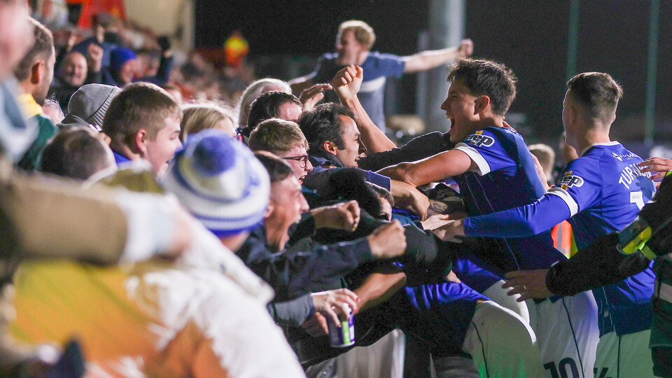 Rubin Colwill celebrates with the City fans.