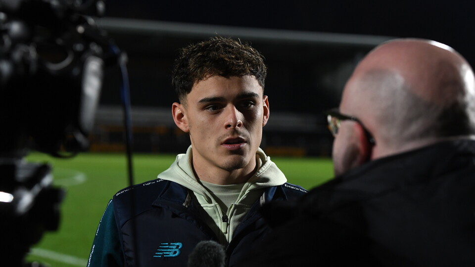 Alex Robertson speaks to the press
