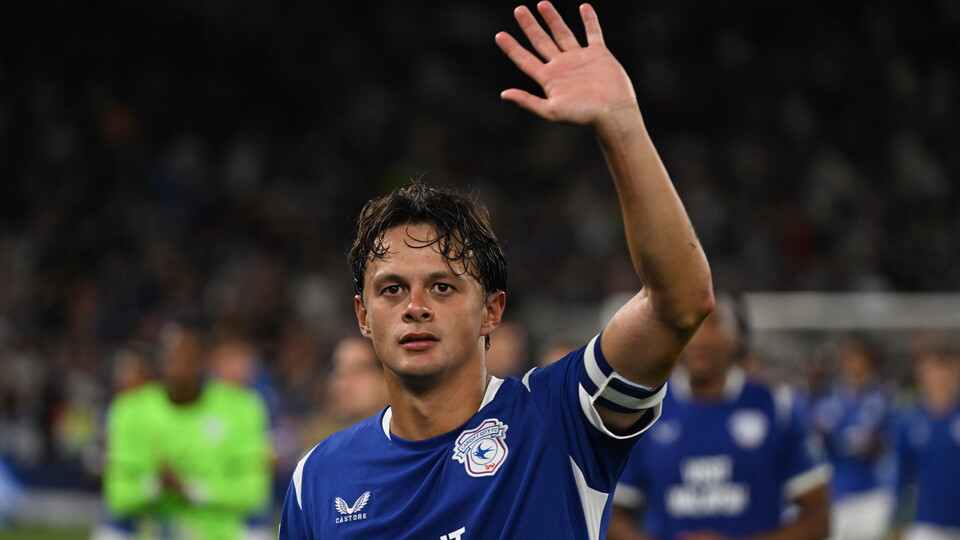 Perry Ng pictured waving at his family following the 1-1 draw with Wrexham at Cardiff City Stadium.